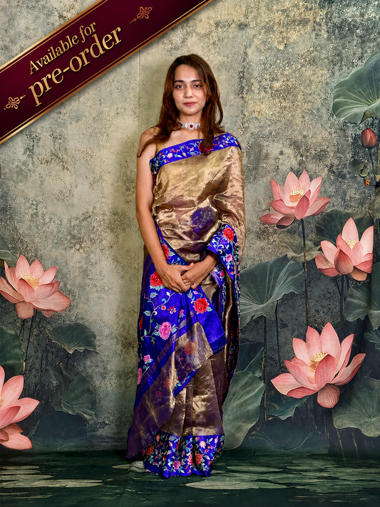 Pure tissue silk saree with petit point work and mashroo satin border.