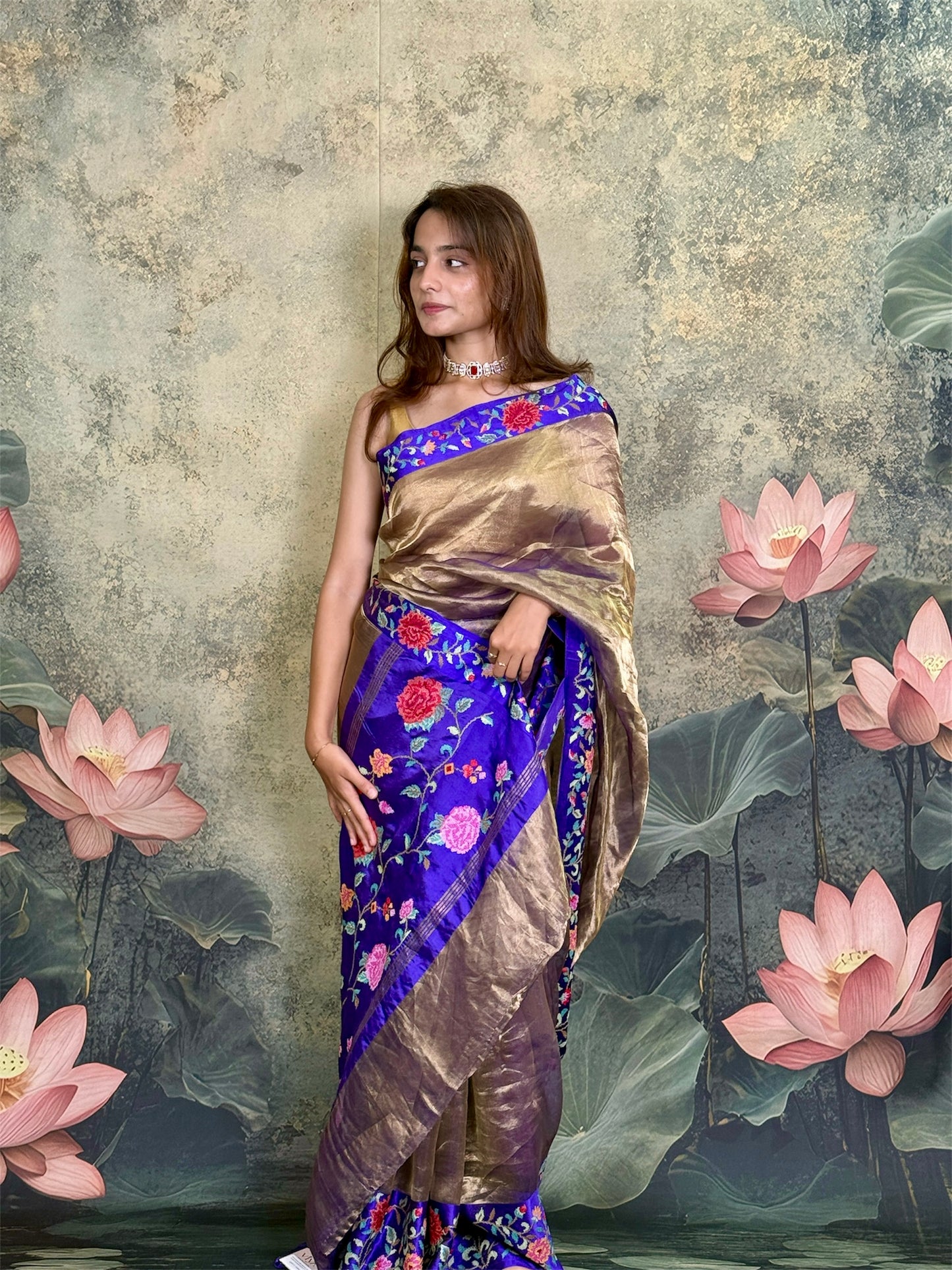 Pure tissue silk saree with petit point work and mashroo satin border.