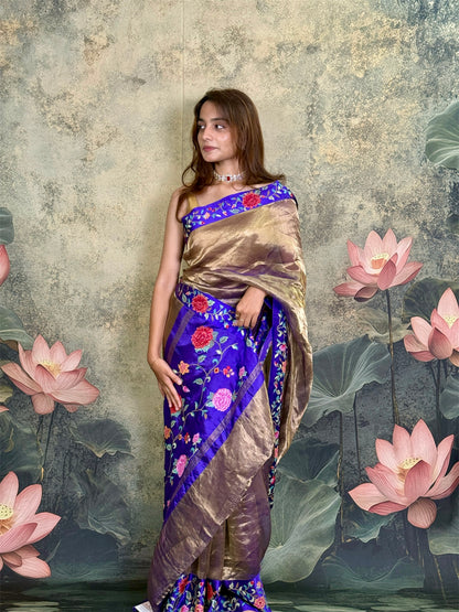Pure tissue silk saree with petit point work and mashroo satin border.
