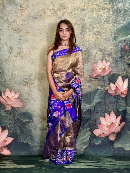 Pure tissue silk saree with petit point work and mashroo satin border.