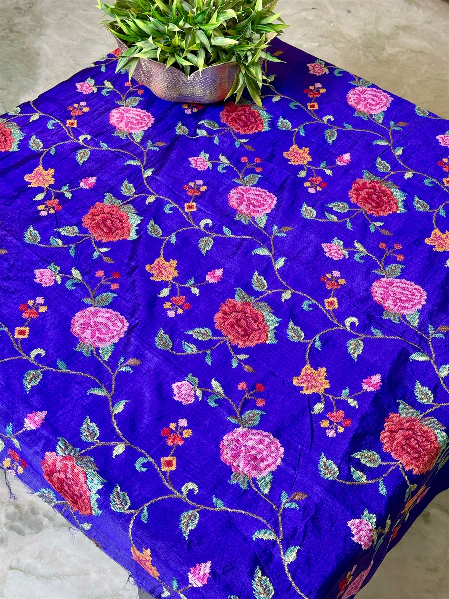 Pure tissue silk saree with petit point work and mashroo satin border.