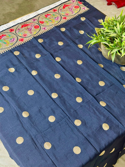 Pure tissue silk saree with zari work and contrast fusion blouse and border.