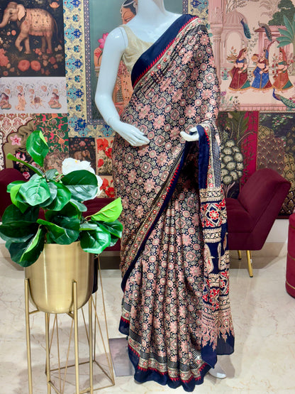 PURE MODAL SILK WITH SEQUENCE HIGHLIGHTING WITH BANDHANI BLOUSE